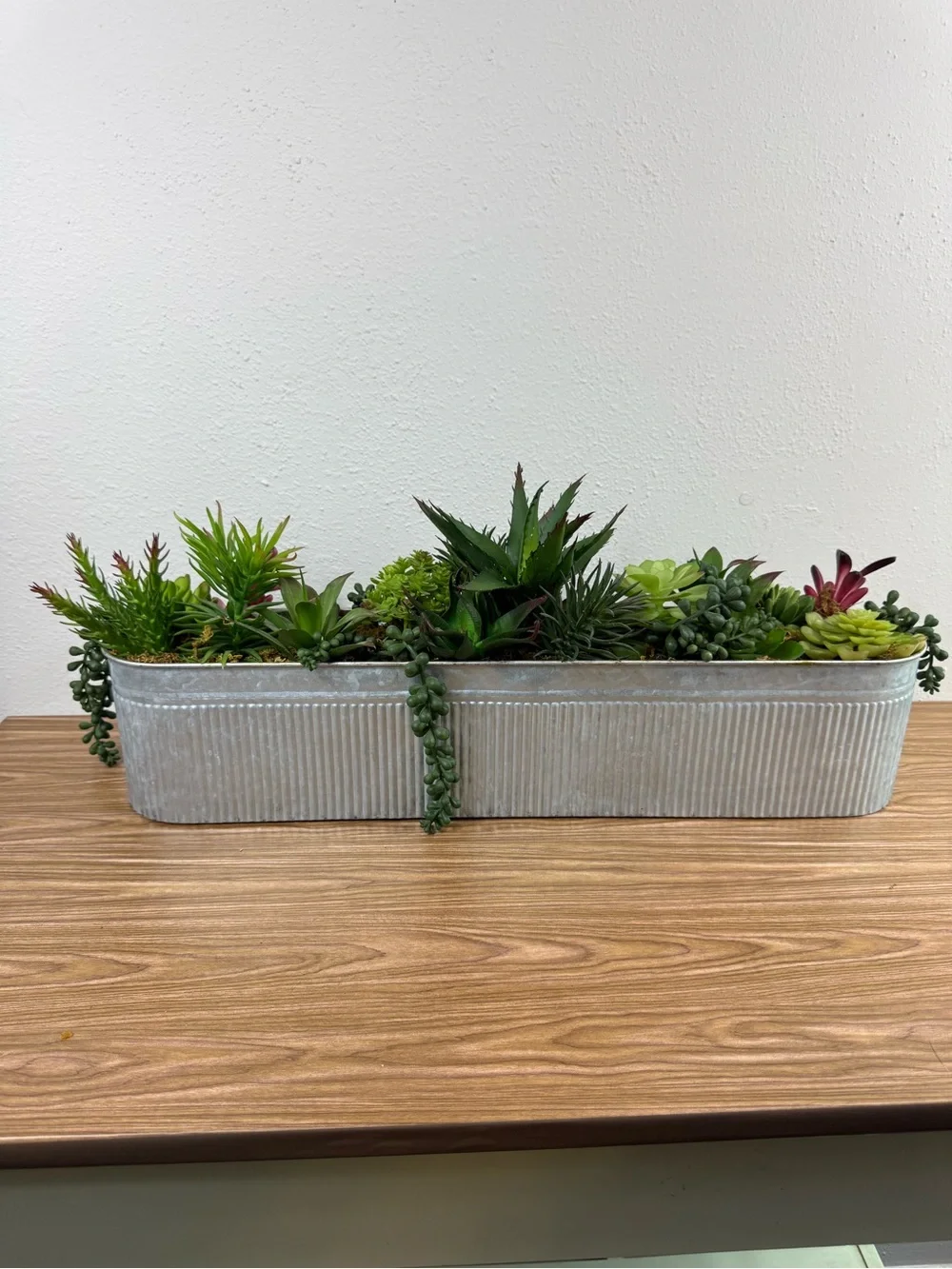 Faux Succulent Centerpiece in Gray Corrugated Planter
